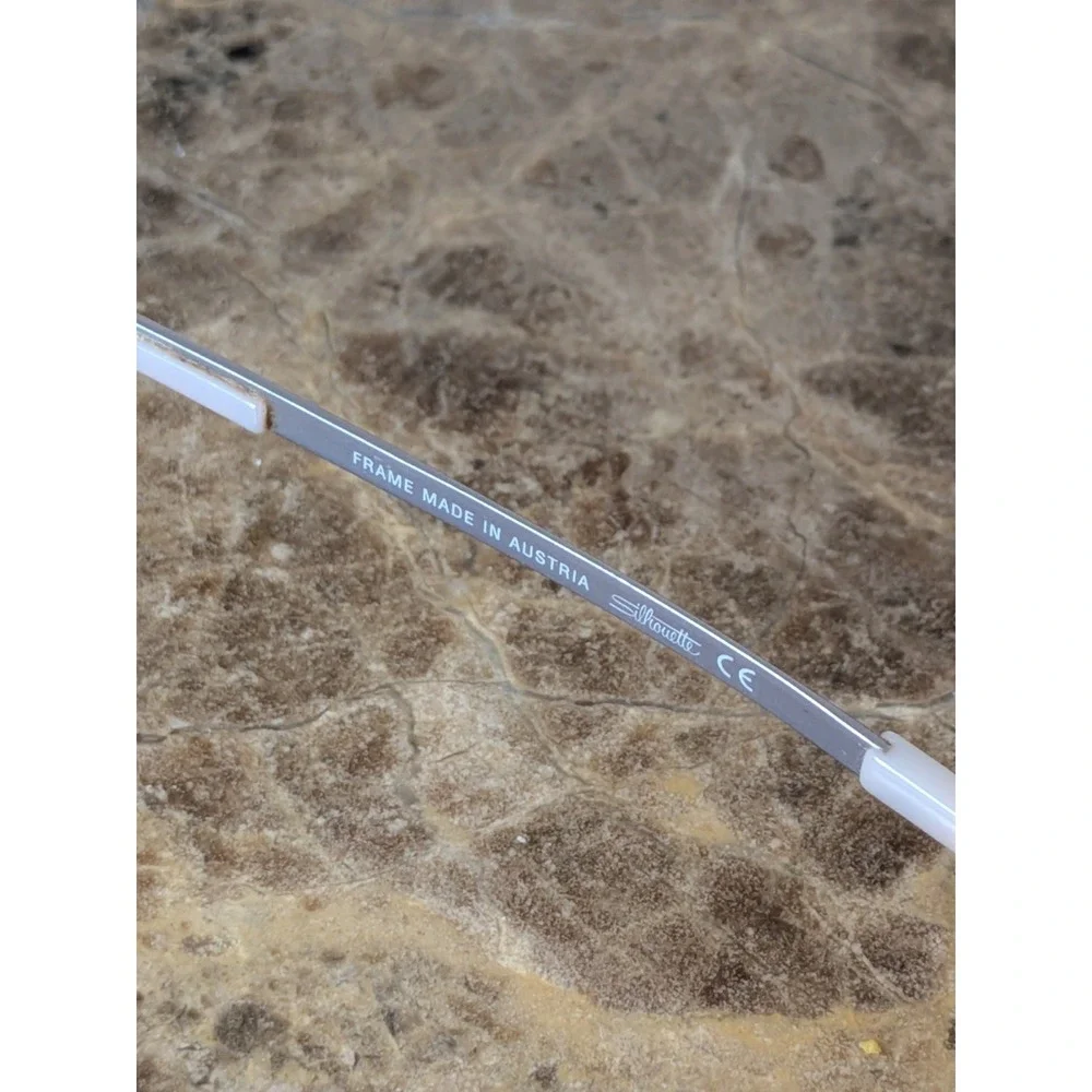 Silhouette Eyeglasses 4476 40 6053 52[]17 135 5416 Titan Creme Rimless Austria